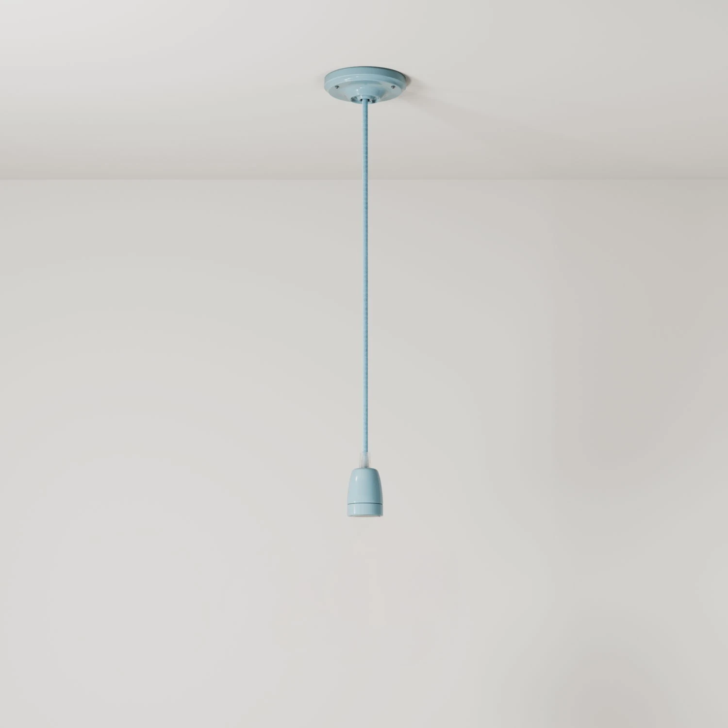 Lampada a sospensione Made in Italy completa di cavo tessile e finiture in porcellana colorata