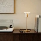 Lampada da tavolo MAG-Y con base metallica tonda e lampadina Ghost trasparente