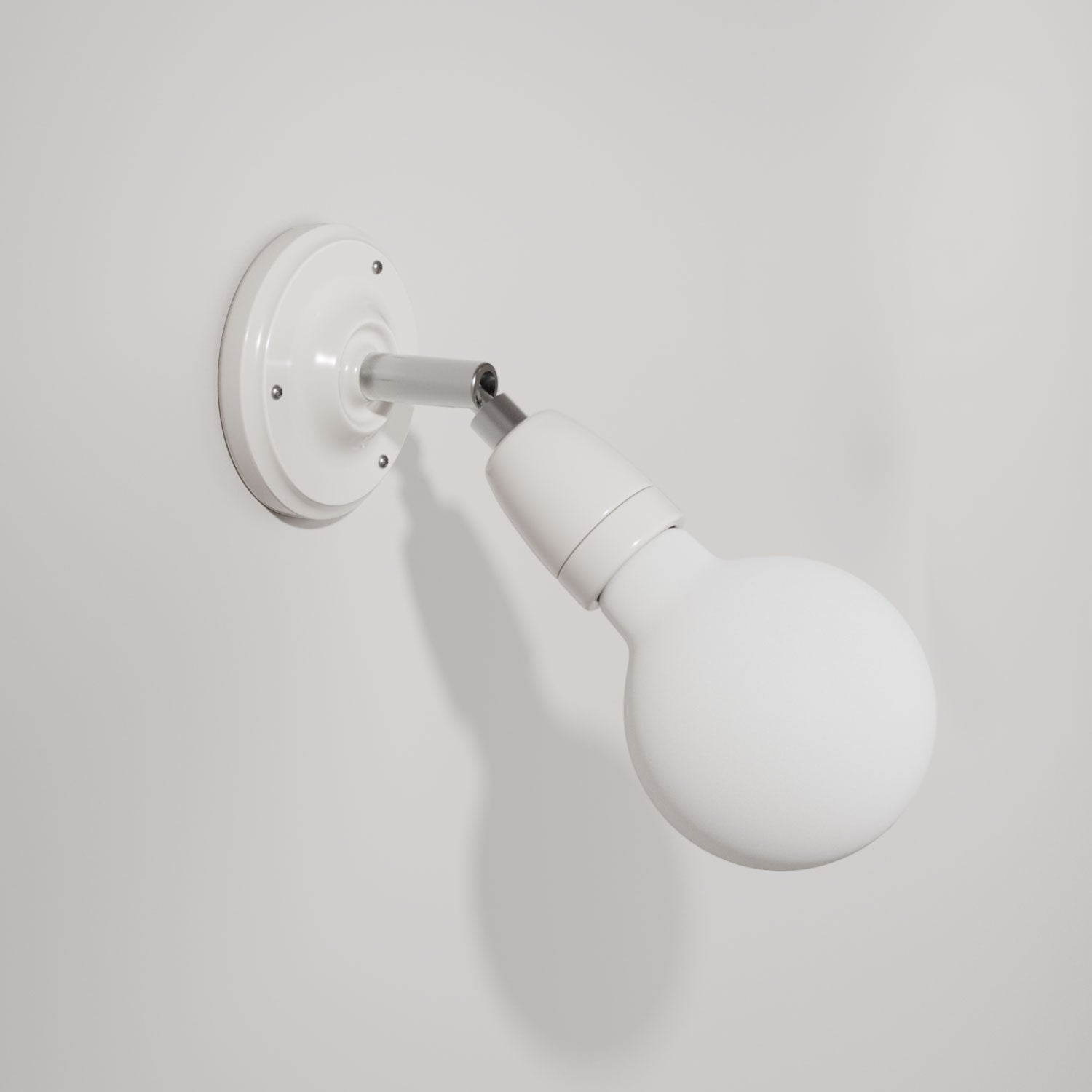 Fermaluce 90° Color, il punto luce orientabile in porcellana da parete o soffitto - Bianco